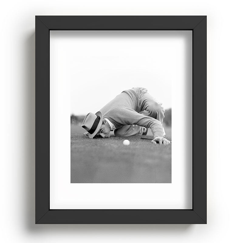 Eye to the ground on the 18th hole; golfing man eyes ball to measure distance to hole vintage black and white portrait photograph - photography - photographs poster Framed Art Print Gallery Image 80