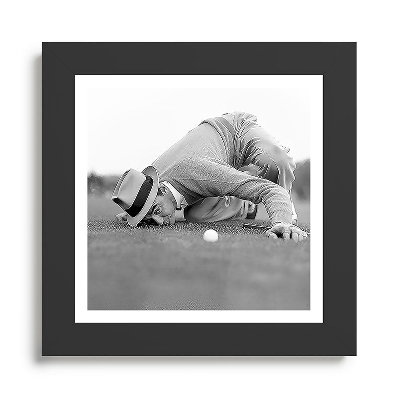 Eye to the ground on the 18th hole; golfing man eyes ball to measure distance to hole vintage black and white portrait photograph - photography - photographs poster Framed Art Print Gallery Image 46