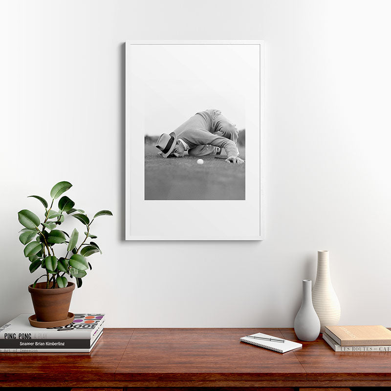 Eye to the ground on the 18th hole; golfing man eyes ball to measure distance to hole vintage black and white portrait photograph - photography - photographs poster Framed Art Print Gallery Image 37