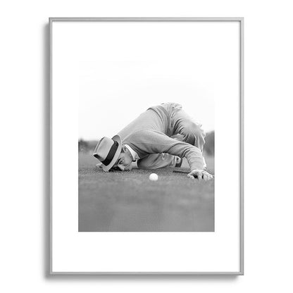 Eye to the ground on the 18th hole; golfing man eyes ball to measure distance to hole vintage black and white portrait photograph - photography - photographs poster Framed Art Print Gallery Image 134