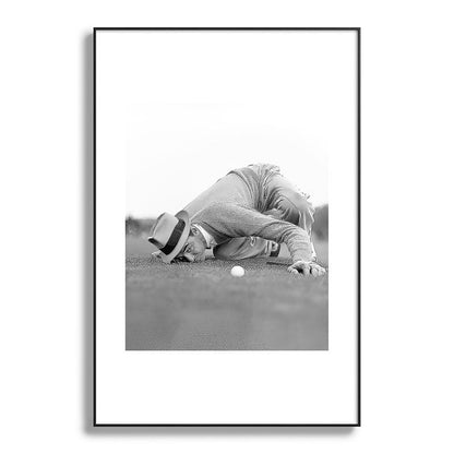 Eye to the ground on the 18th hole; golfing man eyes ball to measure distance to hole vintage black and white portrait photograph - photography - photographs poster Framed Art Print Gallery Image 117