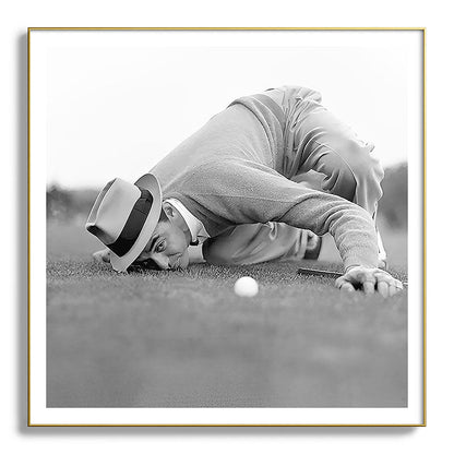 Eye to the ground on the 18th hole; golfing man eyes ball to measure distance to hole vintage black and white portrait photograph - photography - photographs poster Framed Art Print Gallery Image 139