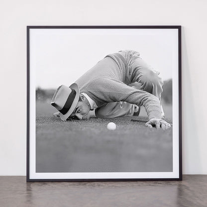 Eye to the ground on the 18th hole; golfing man eyes ball to measure distance to hole vintage black and white portrait photograph - photography - photographs poster Framed Art Print Gallery Image 11