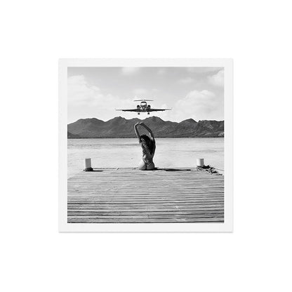 Steady as she goes girl in bikini on a dock with plane landing black and white photograph Art Print Gallery Image 5